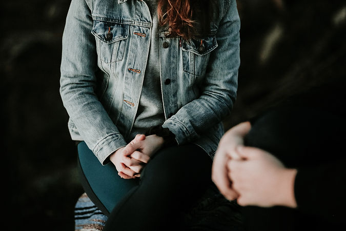 Women sitting to have infertility counselling