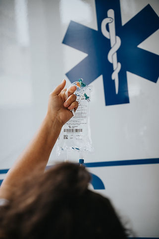 Nurse with IV bag