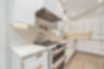 Kitchen with White Shaker Cabinets & Quartz Countertops