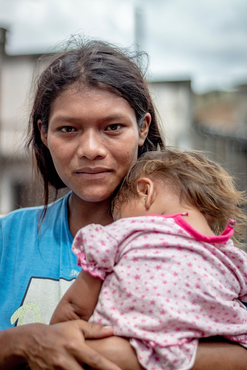 Indigenous parent with young child