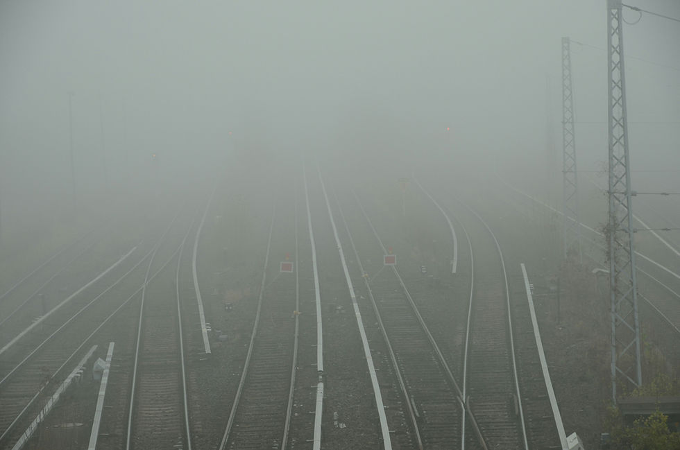 railroad tracks in the fog