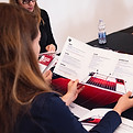 Person looking at a sales brochure