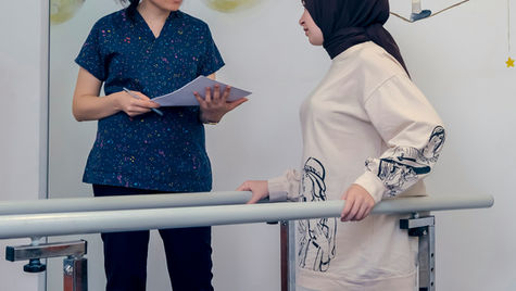 Physiotherapy clinic owner reviewing legal documents
