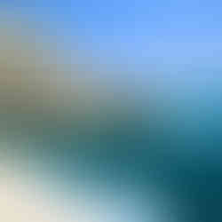 Sunlight filtering through clear water in the underwater caves of the Rosh Hanikra nature reserve.