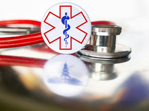 stethoscope with medical badge