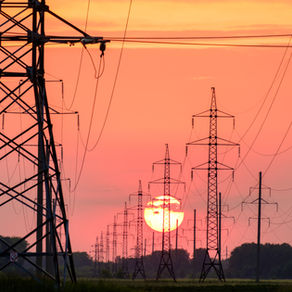Electrical power grid at sunset