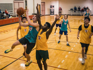Athletes engaging in a teamwork training session