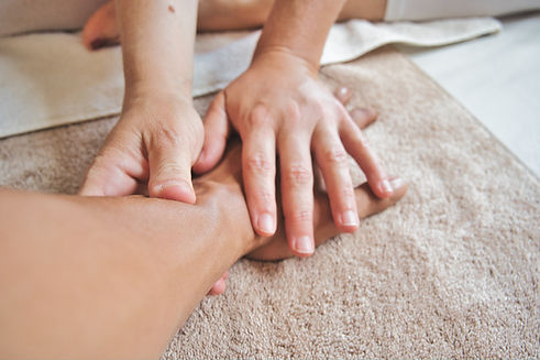 Hands doing a massage.