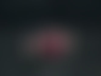 Bouquet of pink roses on a dark ledge, with a metal fence in the background. The scene conveys a somber, reflective mood.