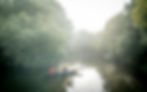 Spiritual Direction Coaching - image shows two people paddling together in a canoe on a misty river