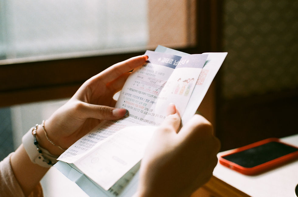 woman reading bills