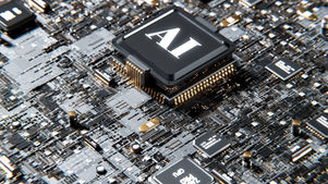 Close-up of a circuit board featuring a prominent black chip labeled "AI" with metallic components and intricate patterns.