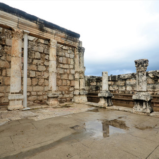 "Ancient limestone ruins of the 4th-century synagogue in Capernaum, the Town of Jesus, on the Sea of Galilee."