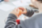 Kid cracking eggs for baking