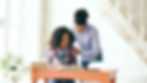 A student is co-regulating with an adult to help with homework.