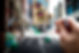 close-up image of glasses in a person's hand