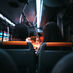 Image of the back of two people sitting on a public bus