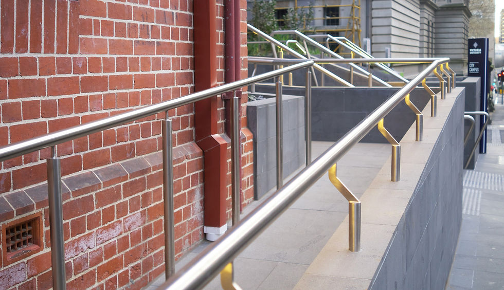 outdoor metal handrails and balustrades along brick steps