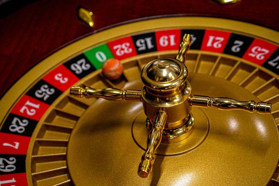 A flashy casino roulette table labeled “000,” designed to attract beginners but offering poor odds—locals recommend avoiding these.