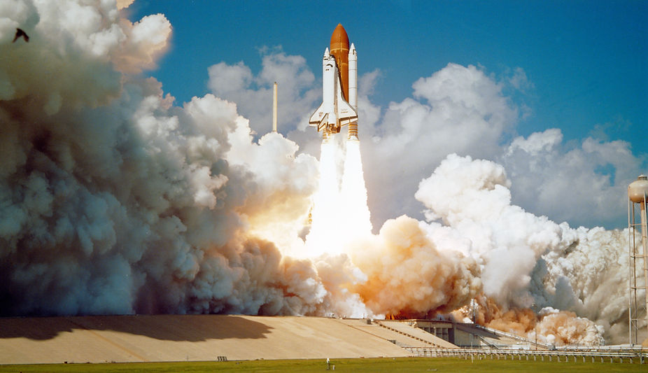 Space shuttle launching from cape canaveral