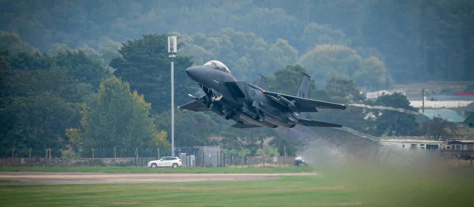 A fighter jet taking off
