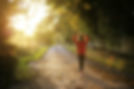 A woman walking down a road