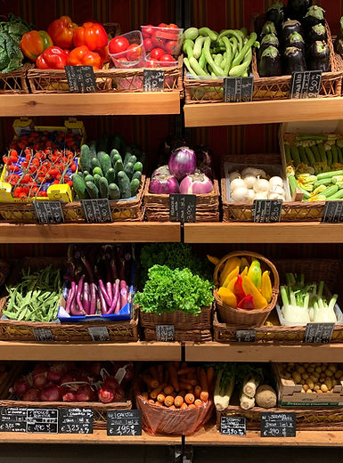 A beautiful market display of delicious looking fruits and vegetables
