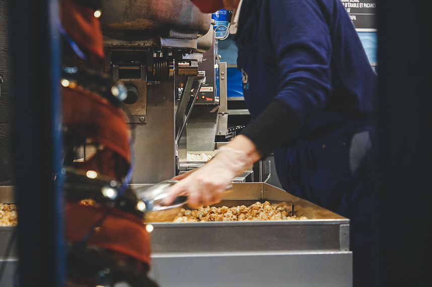 Bricktown Popcorn staff making popcorn.