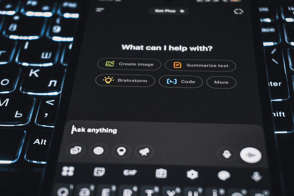 Close-up of a smartphone screen displaying options like "Create image" and "Summarize text." Backlit keyboard visible in the background.
