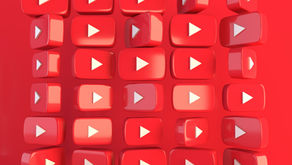 Red 3D play buttons fill the image, arranged in a grid on a vibrant red background, conveying a digital media theme.