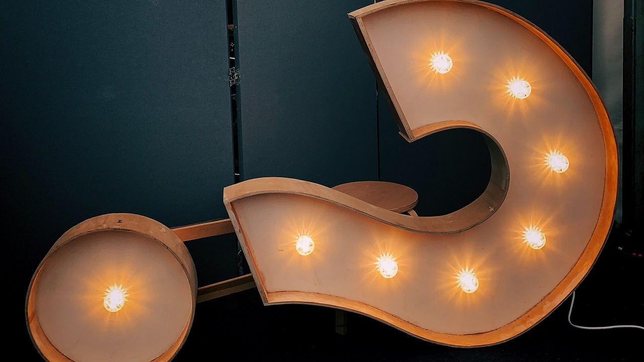 illuminated question mark sign.