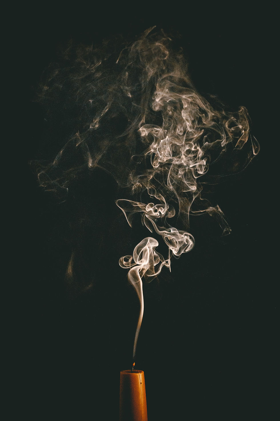 candle snuffed with smoke