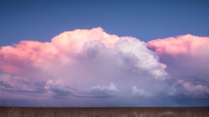 Fluffy clouds at sunset