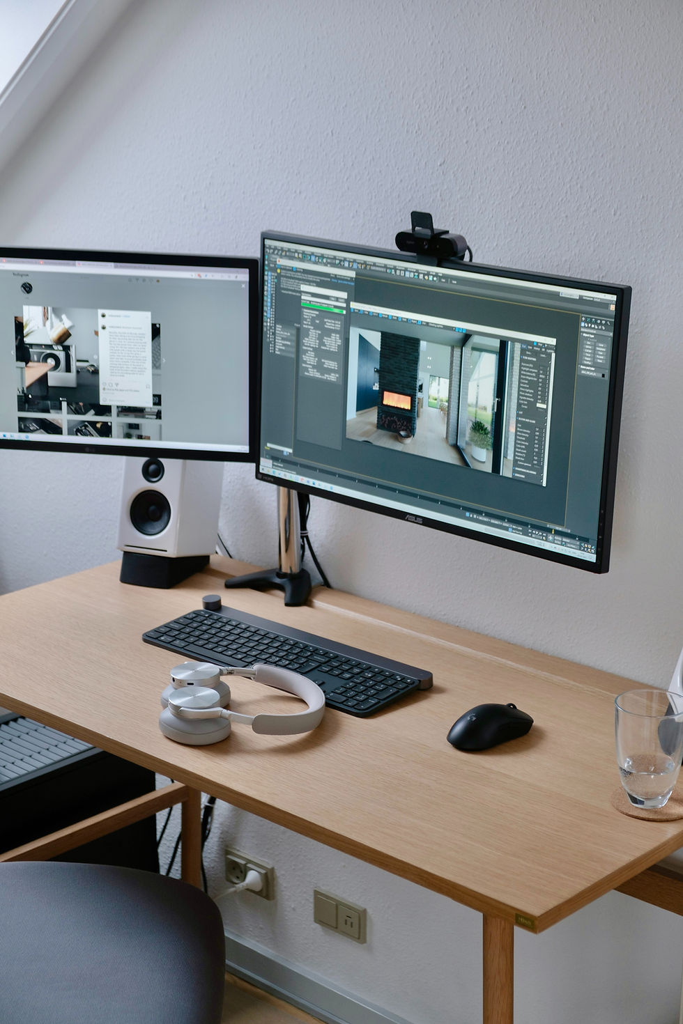 Creative workspace with dual monitors, camera gear, and editing tools for web design and multimedia Image by Lasse Jensen