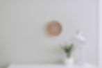 Image by Samantha Gades, a clock is ticking- the time for change is now, lamp- a bright idea or new strategy to market, a green plant- refresh, revitalize your copy, a desk for creating written words that persuade and sell