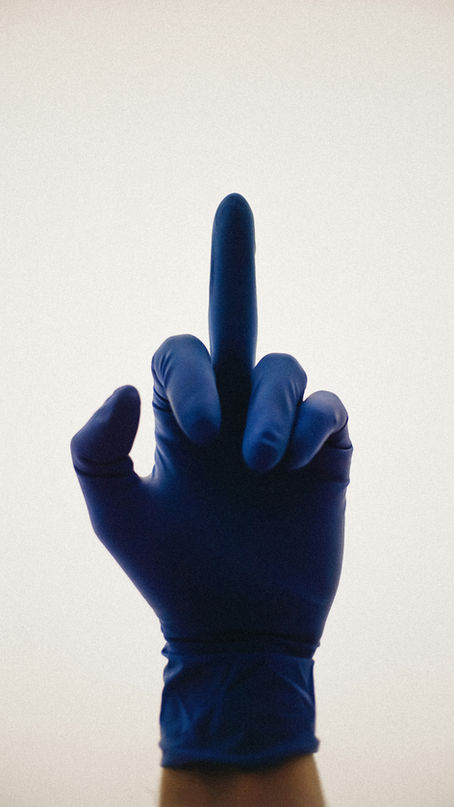 A glove with the middle finger sticking up.