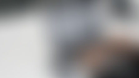 Google search on laptop by professional in office with nice watch and phone in the background