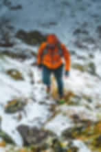 Mountain runer in the lake district running on helvellyn