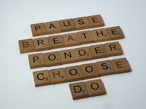 Scrabble tiles spelling words relating to a confidence coaching