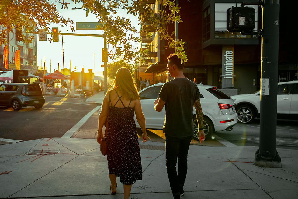 Couple walking on the pavement