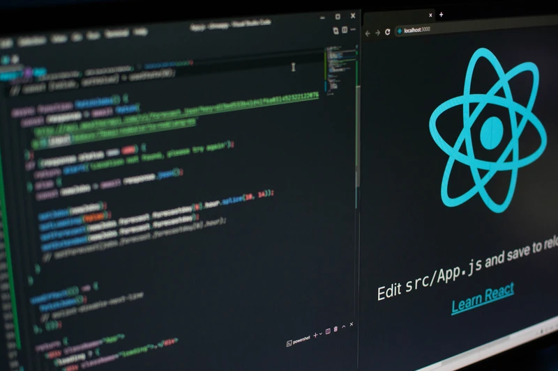 Laptop screen displaying React.js code for beginner developers