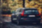 Volvo mechanic performing transmission fluid flush and servicing