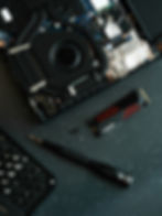 Various technical tools laid across a table
