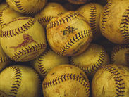 many softballs grouped together