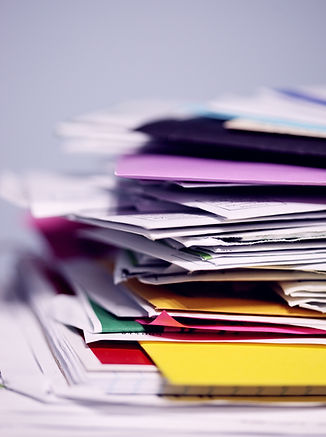 Multicoloured files and notes. Image by Alexander Grey