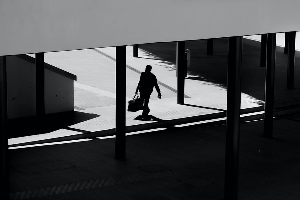 man carrying a bag