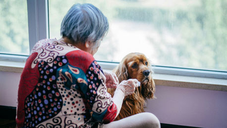 senior woman with dog