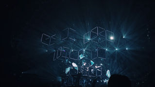 Futuristic digital illustration of interconnected 3D cubes and data fragments illuminated by beams of light, symbolizing AI networks, automation, and digital transformation for small businesses.