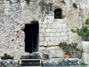 Close-up of the rock-cut entrance to the empty tomb at the Garden Tomb Jerusalem, where pilgrims reflect on the resurrection.