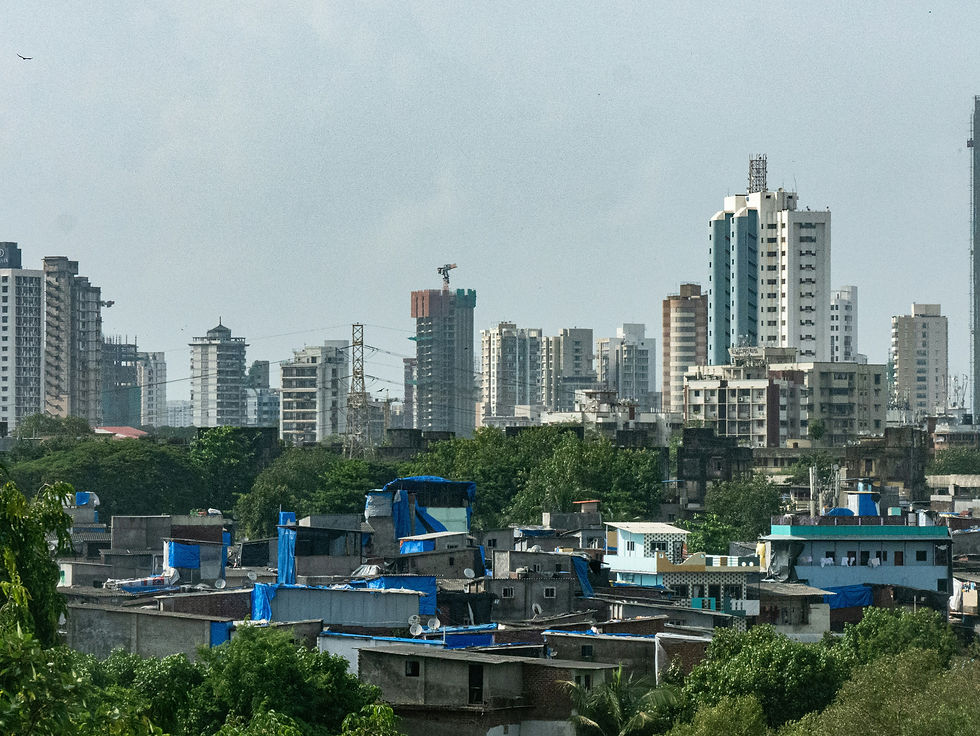 High angle view of Dharavi recycling center with workers sorting materials